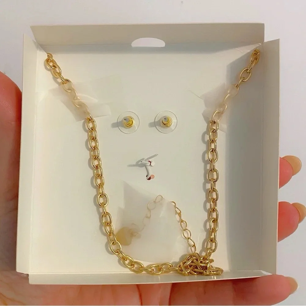 Juicy Couture Rhinestone Pink Champagne Bottle Necklace & Bow Earrings Gift Set